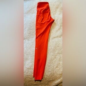 lululemon athletica Orange Leggings, 7/8. Size 6